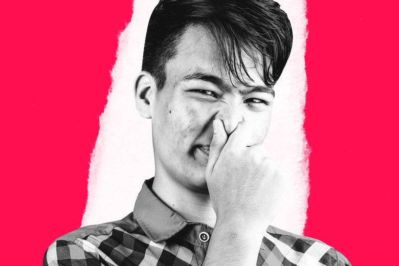 Man holding nose to avoid a smell.